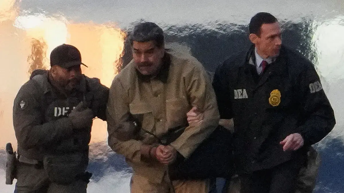 Venezuelan leader Nicolas Maduro being escorted after capture